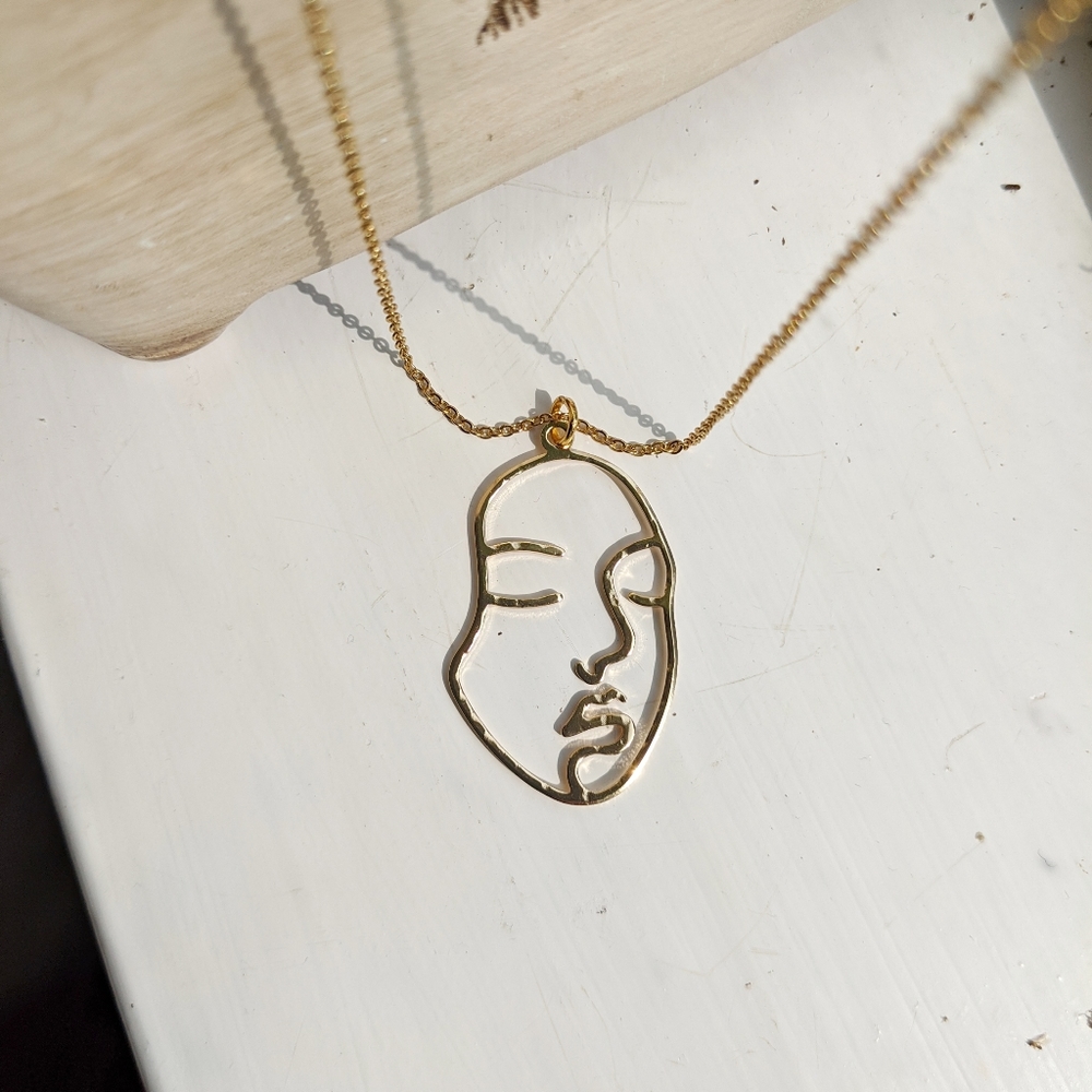 Face abstract necklace